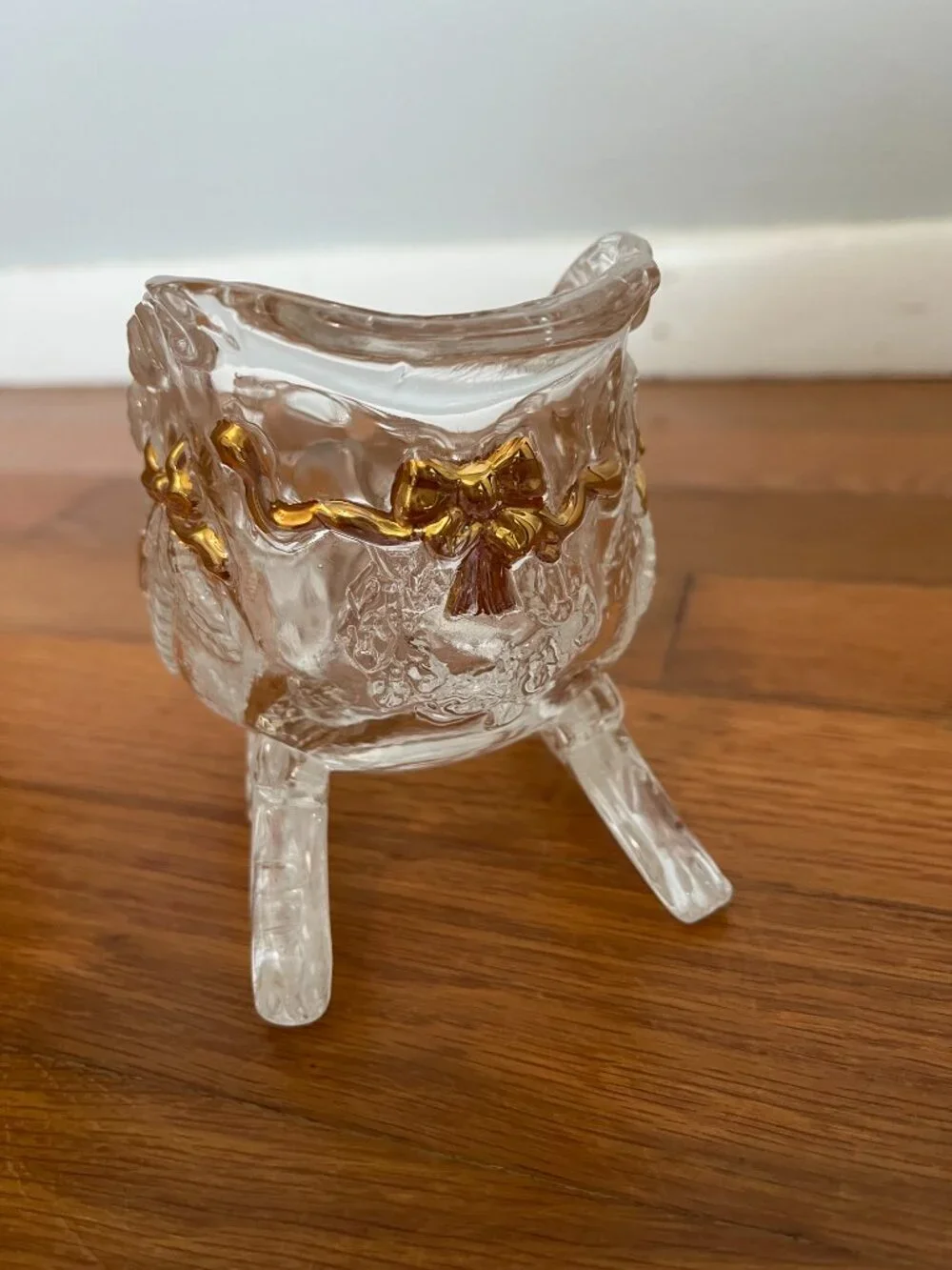 Glass sleigh with decorative gold-painted bows | Vintage